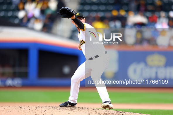 Las Aguilas Cibaenas pitcher Nick Wittgren #94 throws during the fourth inning of a baseball game against Los Tigres del Licey at Citi Field...