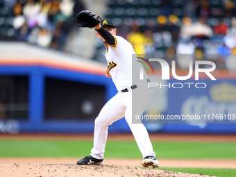 Las Aguilas Cibaenas pitcher Nick Wittgren #94 throws during the fourth inning of a baseball game against Los Tigres del Licey at Citi Field...