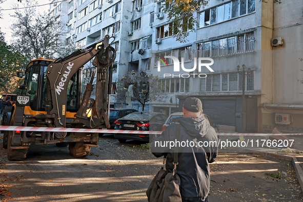 The area around a residential building damaged by the Russian drone attack is fenced with signal tape in Khadzhybeiskyi district of Odesa, s...