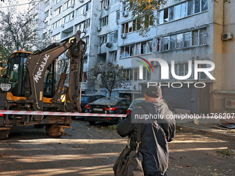 The area around a residential building damaged by the Russian drone attack is fenced with signal tape in Khadzhybeiskyi district of Odesa, s...