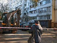 The area around a residential building damaged by the Russian drone attack is fenced with signal tape in Khadzhybeiskyi district of Odesa, s...