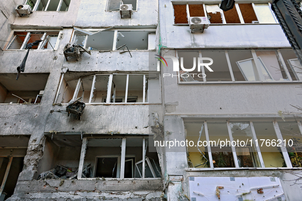 The facade of a residential building in the Khadzhybeiskyi district is damaged by a Russian drone attack in Odesa, Ukraine, on November 7, 2...