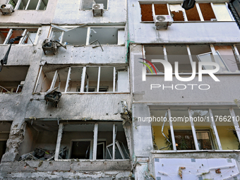 The facade of a residential building in the Khadzhybeiskyi district is damaged by a Russian drone attack in Odesa, Ukraine, on November 7, 2...