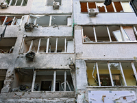 The facade of a residential building in the Khadzhybeiskyi district is damaged by a Russian drone attack in Odesa, Ukraine, on November 7, 2...