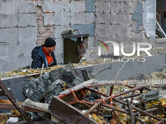 The facade of a residential building in the Khadzhybeiskyi district is damaged by a Russian drone attack in Odesa, Ukraine, on November 7, 2...