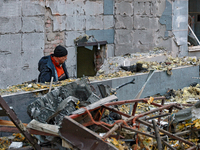 The facade of a residential building in the Khadzhybeiskyi district is damaged by a Russian drone attack in Odesa, Ukraine, on November 7, 2...