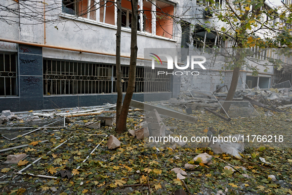 The facade of a residential building in the Khadzhybeiskyi district is damaged by a Russian drone attack in Odesa, Ukraine, on November 7, 2...