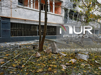 The facade of a residential building in the Khadzhybeiskyi district is damaged by a Russian drone attack in Odesa, Ukraine, on November 7, 2...