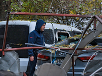 Cars are damaged by a Russian drone attack in the Khadzhybeiskyi district of Odesa, Ukraine, on November 7, 2024. (