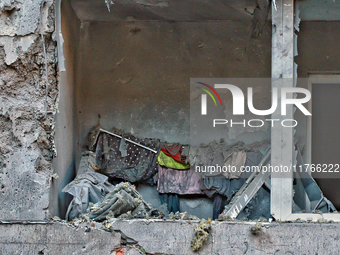 The facade of a residential building in the Khadzhybeiskyi district is damaged by a Russian drone attack in Odesa, Ukraine, on November 7, 2...