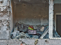 The facade of a residential building in the Khadzhybeiskyi district is damaged by a Russian drone attack in Odesa, Ukraine, on November 7, 2...