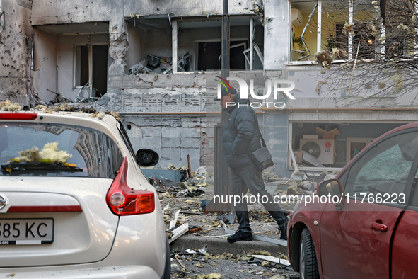 The facade of a residential building in the Khadzhybeiskyi district is damaged by a Russian drone attack in Odesa, Ukraine, on November 7, 2...