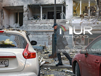 The facade of a residential building in the Khadzhybeiskyi district is damaged by a Russian drone attack in Odesa, Ukraine, on November 7, 2...