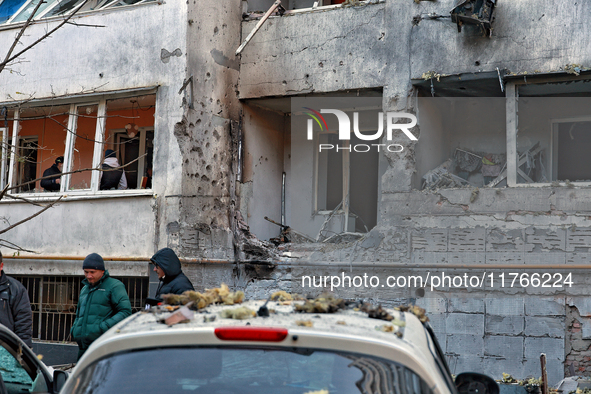 The facade of a residential building in the Khadzhybeiskyi district is damaged by a Russian drone attack in Odesa, Ukraine, on November 7, 2...