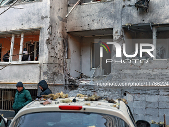 The facade of a residential building in the Khadzhybeiskyi district is damaged by a Russian drone attack in Odesa, Ukraine, on November 7, 2...