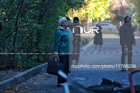 The area around a residential building damaged by the Russian drone attack is fenced with signal tape in Khadzhybeiskyi district of Odesa, s...