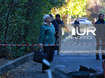 The area around a residential building damaged by the Russian drone attack is fenced with signal tape in Khadzhybeiskyi district of Odesa, s...