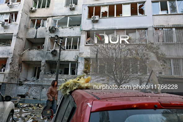 The facade of a residential building in the Khadzhybeiskyi district is damaged by a Russian drone attack in Odesa, Ukraine, on November 7, 2...