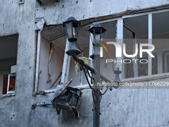 The facade of a residential building in the Khadzhybeiskyi district is damaged by a Russian drone attack in Odesa, Ukraine, on November 7, 2...