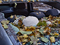 A woman's hat is in a car mutilated by a Russian drone attack in Khadzhybeiskyi district of Odesa, southern Ukraine, on November 7, 2024. (