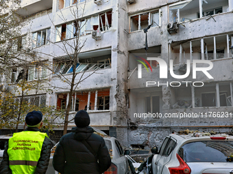 The facade of a residential building in the Khadzhybeiskyi district is damaged by a Russian drone attack in Odesa, Ukraine, on November 7, 2...