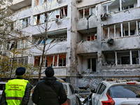 The facade of a residential building in the Khadzhybeiskyi district is damaged by a Russian drone attack in Odesa, Ukraine, on November 7, 2...