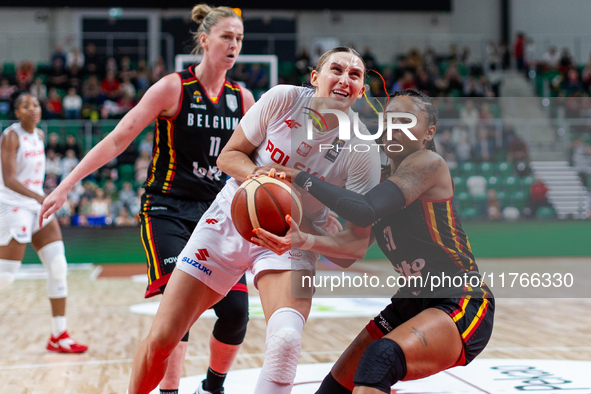 Anna Makurat and Maxuela Lisowa Mbaka in action during the FIBA 2025 European Women's Basketball Championship Qualifiers Group C match betwe...