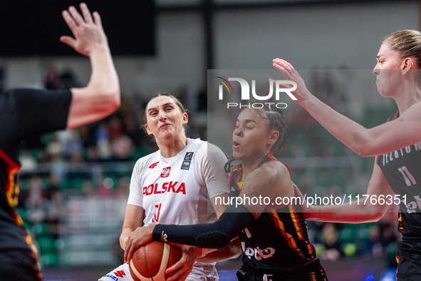 Anna Makurat and Maxuela Lisowa Mbaka in action during the FIBA 2025 European Women's Basketball Championship Qualifiers Group C match betwe...