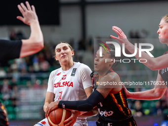 Anna Makurat and Maxuela Lisowa Mbaka in action during the FIBA 2025 European Women's Basketball Championship Qualifiers Group C match betwe...