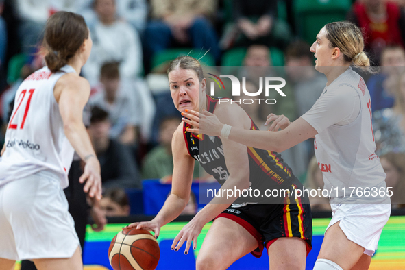 Becky Massey and  Anna Makurat in action during the FIBA 2025 European Women's Basketball Championship Qualifiers Group C match between Pola...