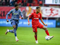 AFC Ajax Amsterdam forward Chuba Akpom and FC Twente defender Anass Salah-Eddine play during the match between Twente and Ajax at the Grolsc...