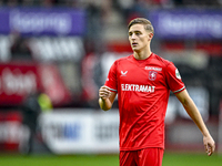 FC Twente defender Max Bruns plays during the match between Twente and Ajax at the Grolsch Veste stadium for the Dutch Eredivisie season 202...