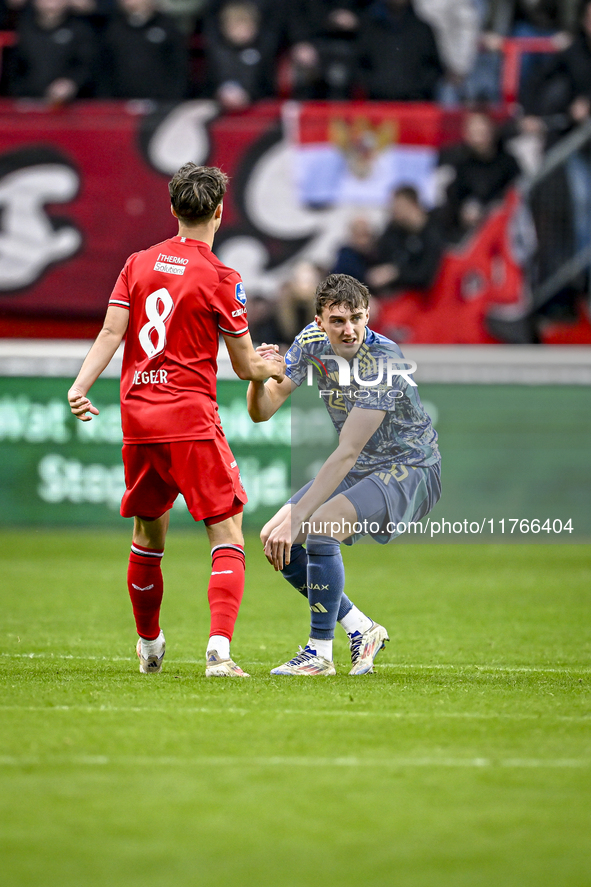 FC Twente midfielder Youri Regeer and AFC Ajax Amsterdam defender Youri Baas play during the match between Twente and Ajax at the Grolsch Ve...