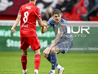 FC Twente midfielder Youri Regeer and AFC Ajax Amsterdam defender Youri Baas play during the match between Twente and Ajax at the Grolsch Ve...