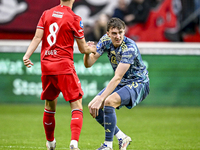 FC Twente midfielder Youri Regeer and AFC Ajax Amsterdam defender Youri Baas play during the match between Twente and Ajax at the Grolsch Ve...