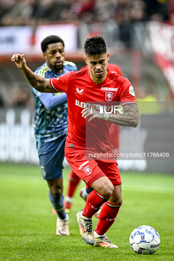 FC Twente defender Mees Hilgers plays during the match between Twente and Ajax at the Grolsch Veste stadium for the Dutch Eredivisie season...