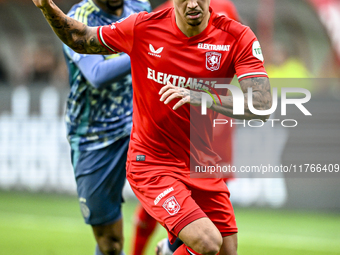 FC Twente defender Mees Hilgers plays during the match between Twente and Ajax at the Grolsch Veste stadium for the Dutch Eredivisie season...