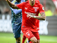 FC Twente defender Mees Hilgers plays during the match between Twente and Ajax at the Grolsch Veste stadium for the Dutch Eredivisie season...