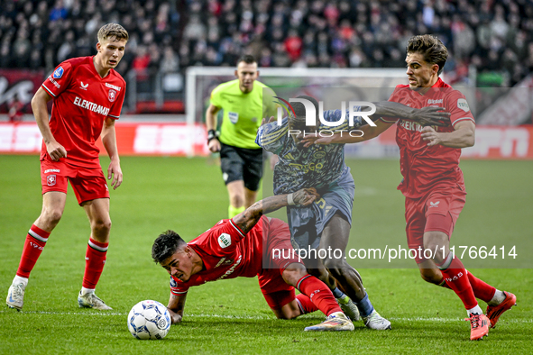 FC Twente midfielder Gijs Besselink, FC Twente defender Mees Hilgers, AFC Ajax Amsterdam forward Brian Brobbey, and FC Twente defender Bart...