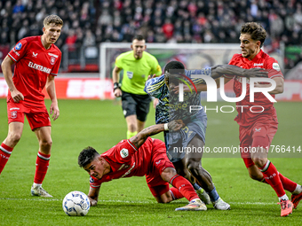 FC Twente midfielder Gijs Besselink, FC Twente defender Mees Hilgers, AFC Ajax Amsterdam forward Brian Brobbey, and FC Twente defender Bart...