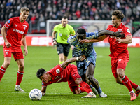 FC Twente midfielder Gijs Besselink, FC Twente defender Mees Hilgers, AFC Ajax Amsterdam forward Brian Brobbey, and FC Twente defender Bart...