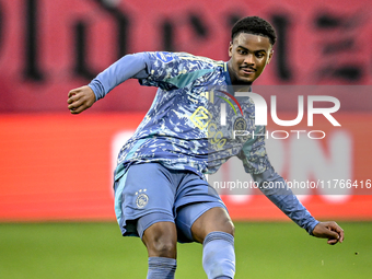 AFC Ajax Amsterdam defender Jorrel Hato plays during the match between Twente and Ajax at the Grolsch Veste stadium for the Dutch Eredivisie...