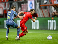 AFC Ajax Amsterdam defender Youri Baas and FC Twente midfielder Youri Regeer play during the match between Twente and Ajax at the Grolsch Ve...