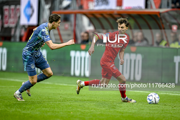 AFC Ajax Amsterdam defender Youri Baas and FC Twente midfielder Youri Regeer play during the match between Twente and Ajax at the Grolsch Ve...