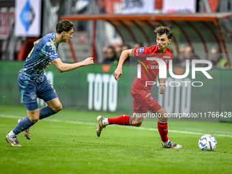 AFC Ajax Amsterdam defender Youri Baas and FC Twente midfielder Youri Regeer play during the match between Twente and Ajax at the Grolsch Ve...