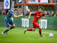 AFC Ajax Amsterdam defender Youri Baas and FC Twente midfielder Youri Regeer play during the match between Twente and Ajax at the Grolsch Ve...