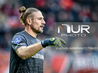 FC Twente goalkeeper Lars Unnerstall plays during the match between Twente and Ajax at the Grolsch Veste stadium for the Dutch Eredivisie se...