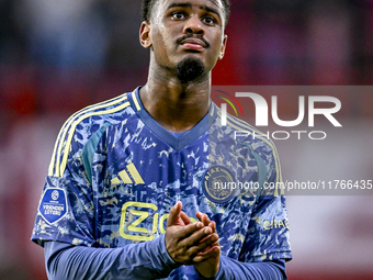 AFC Ajax Amsterdam defender Jorrel Hato plays during the match between Twente and Ajax at the Grolsch Veste stadium for the Dutch Eredivisie...