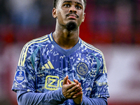 AFC Ajax Amsterdam defender Jorrel Hato plays during the match between Twente and Ajax at the Grolsch Veste stadium for the Dutch Eredivisie...