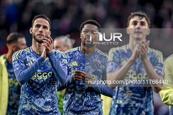 AFC Ajax Amsterdam midfielder Branco van den Boomen and AFC Ajax Amsterdam forward Chuba Akpom participate in the match between Twente and A...